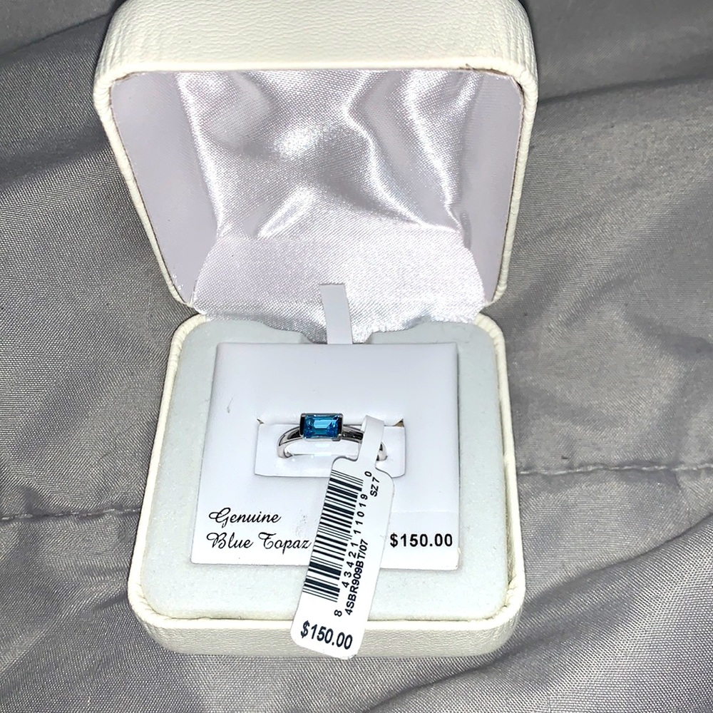 Brand new sterling silver Blue Topaz ring